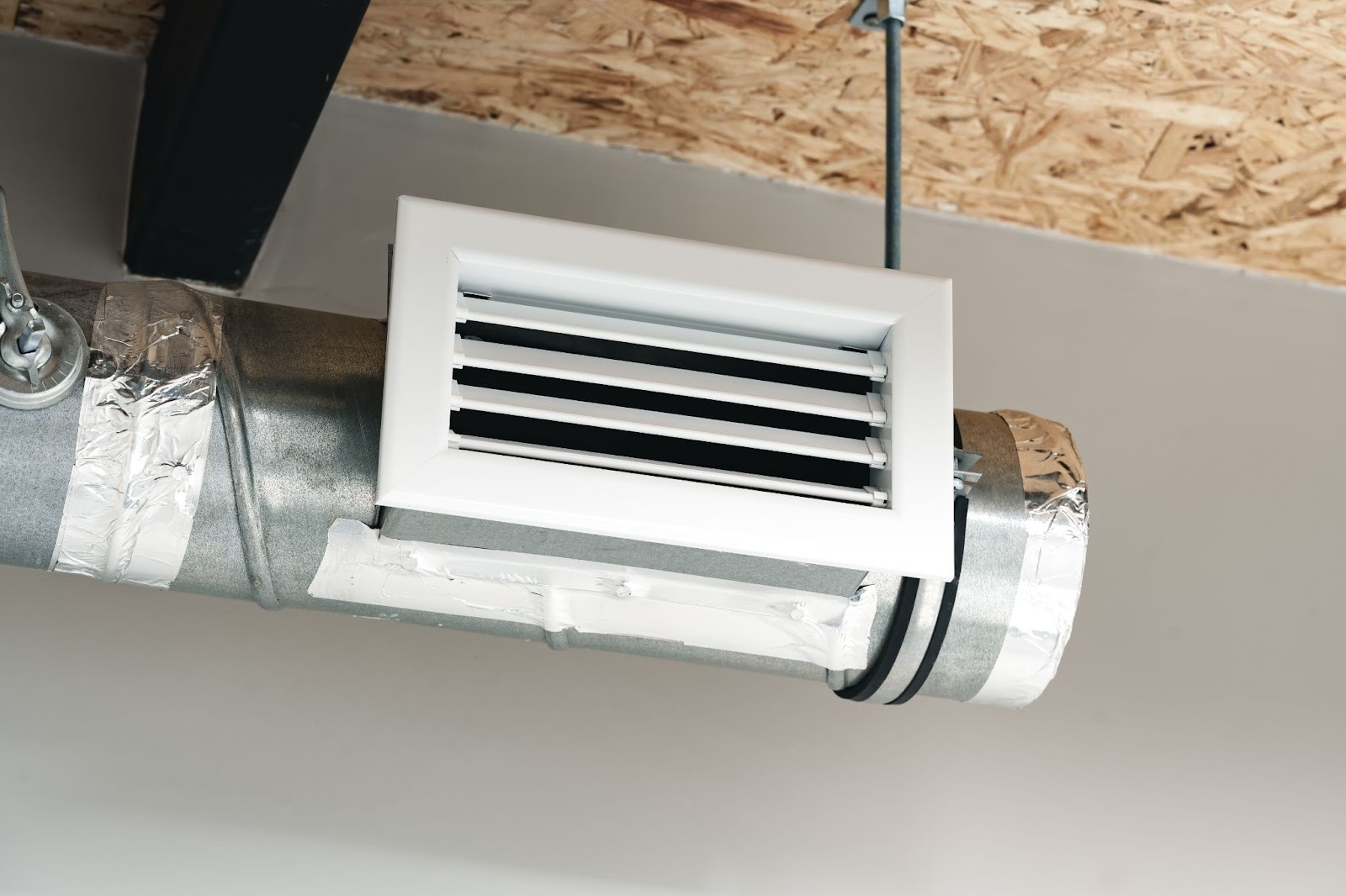 Ventilation pipes installed along the ceiling for a home heat recovery ventilation system