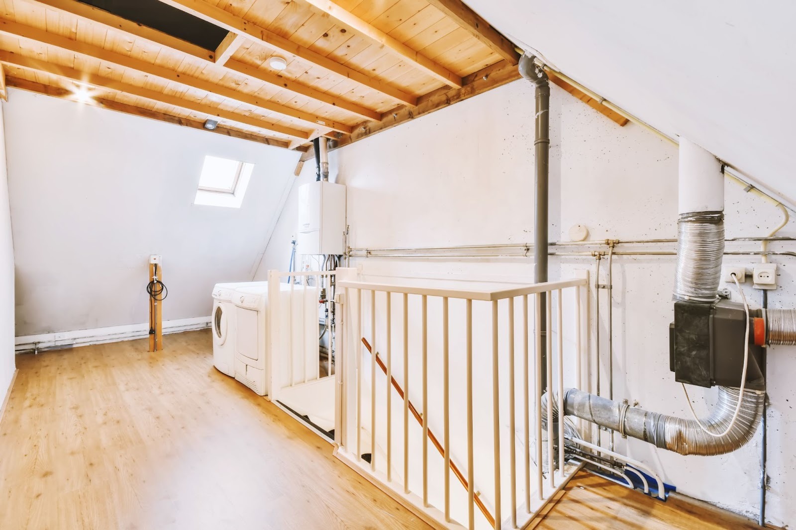 Energy recovery ventilator (ERV) system installed in a residential attic for whole-home ventilation