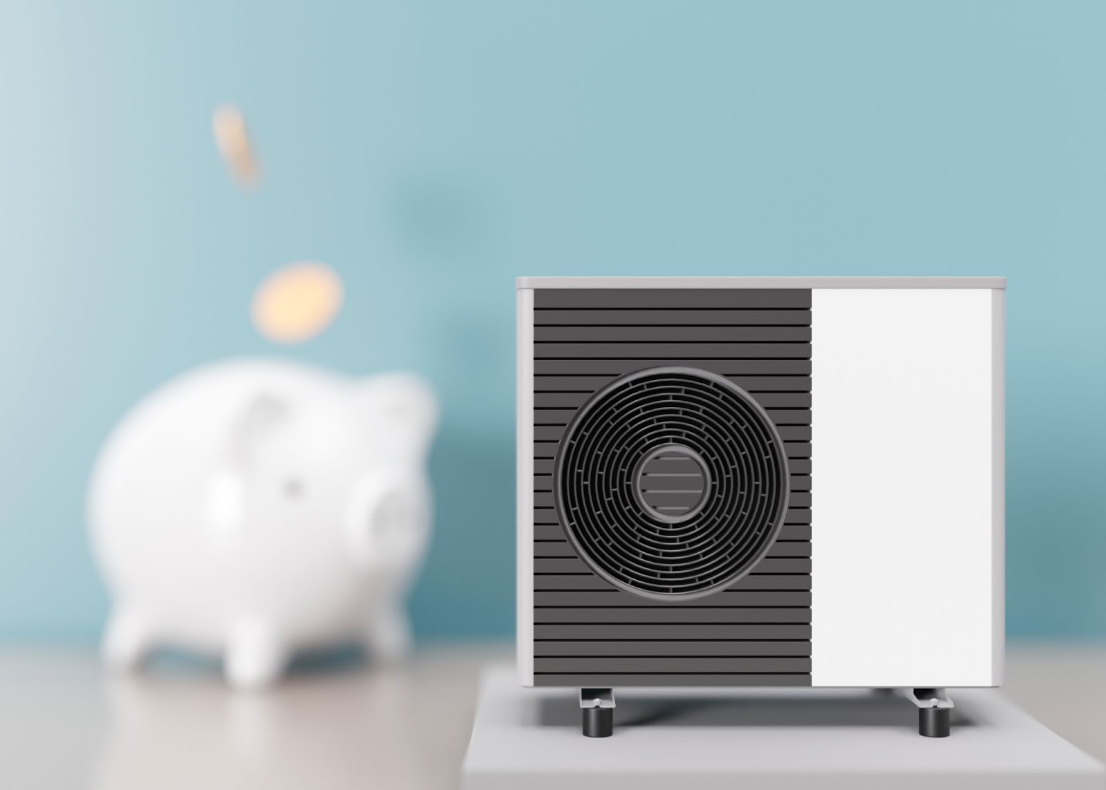Air heat pump with piggy bank on blue background representing heat pump installation cost